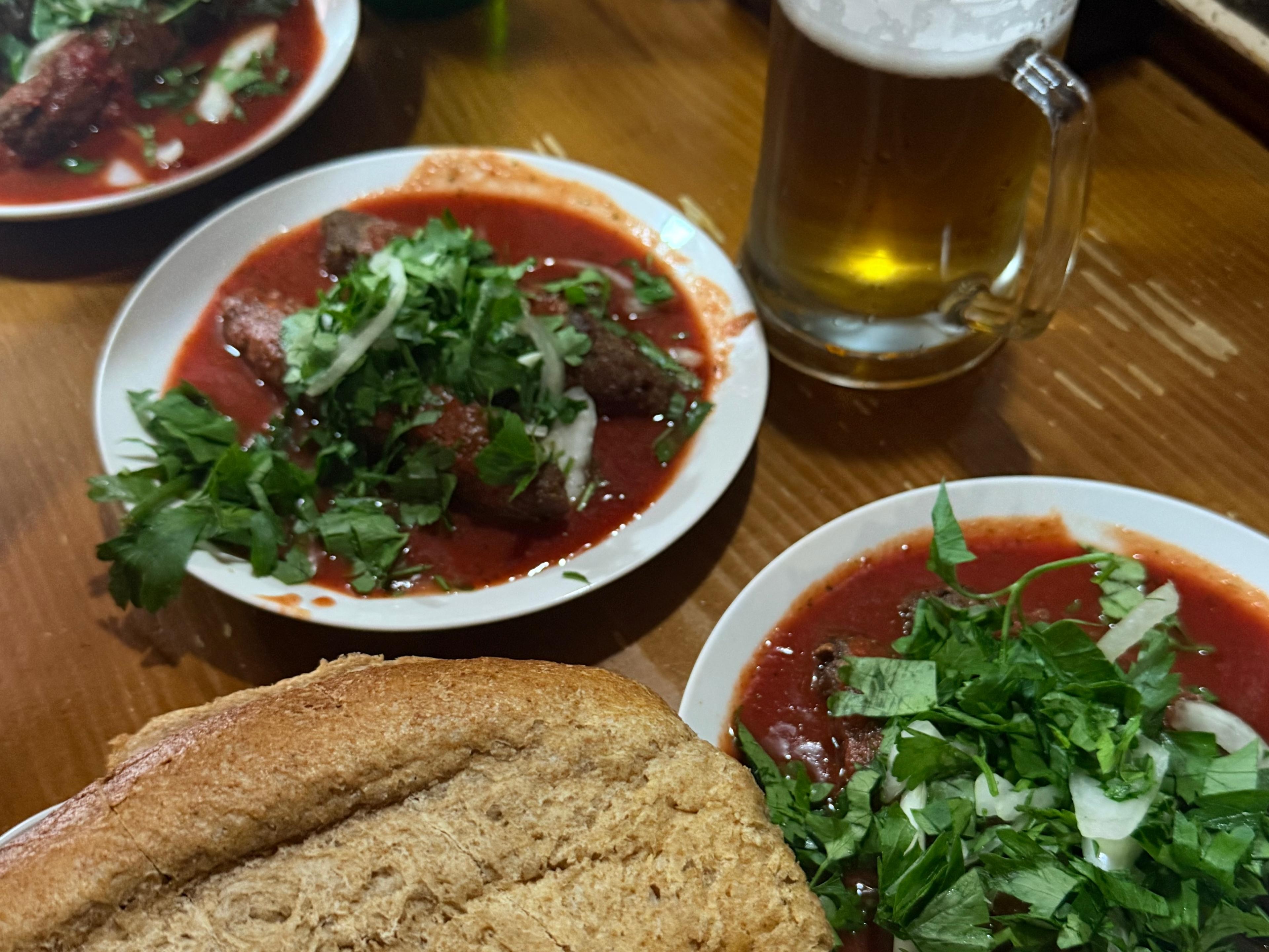 Traditional Georgian food spread with herbs and bread